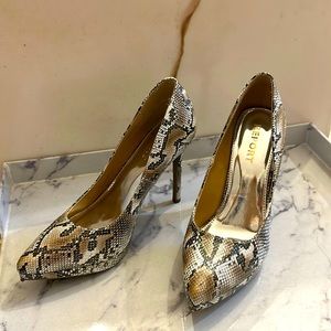 Report snake skin heels